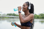 Sportwoman drinking fresh water